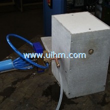 induction coil mounted in an isolation box