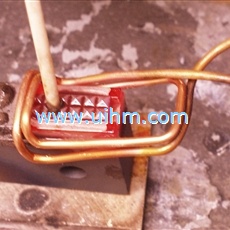 induction brazing carbide teeth to steel pipe