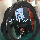 UM-20A-UHF with flexible handheld induction coil for jointing
