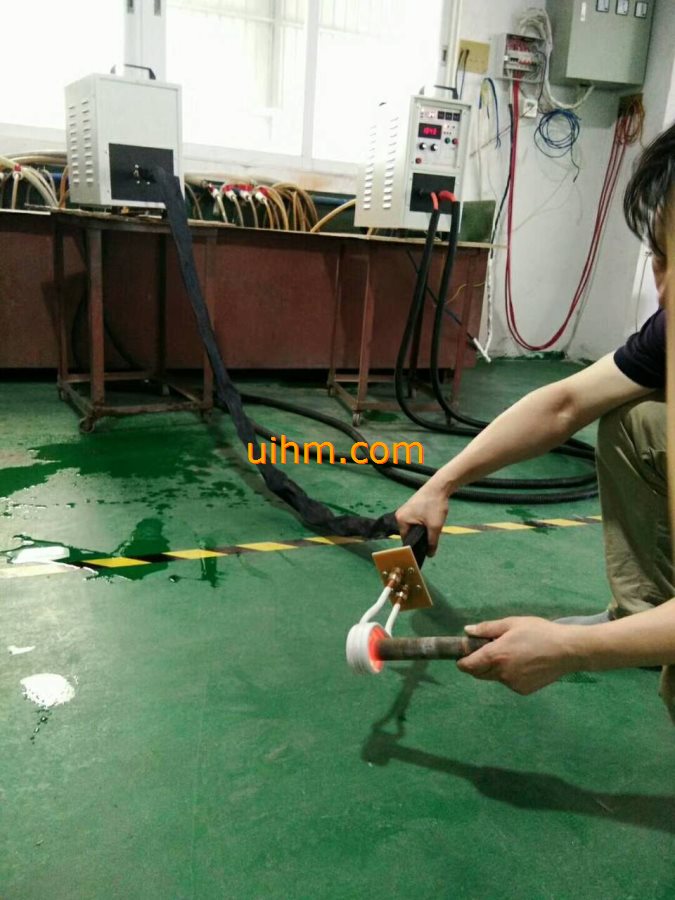 induction heating steel rod by water cooled flexible induction coil induction heating steel rod by water cooled flexible induction coil
